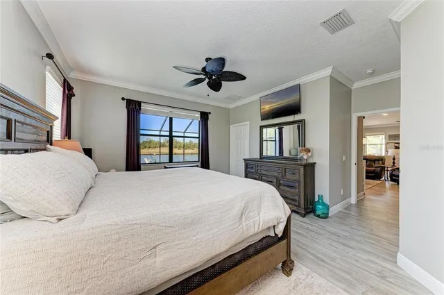a living room with stainless steel appliances kitchen island granite countertop a stove and a sink