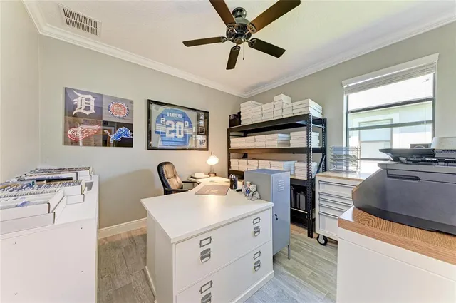 a view of a patio with couches chairs under an umbrella