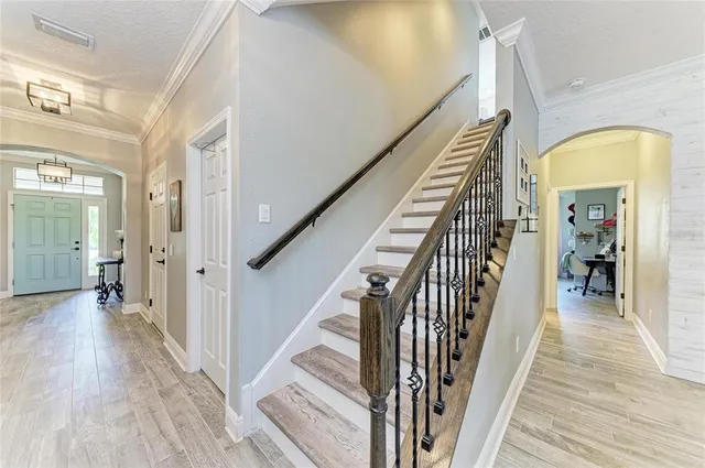 a view of a chairs and table in the patio