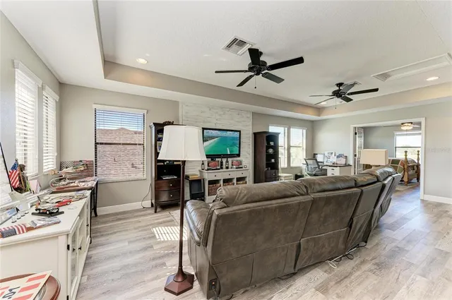 a view of a swimming pool with a patio