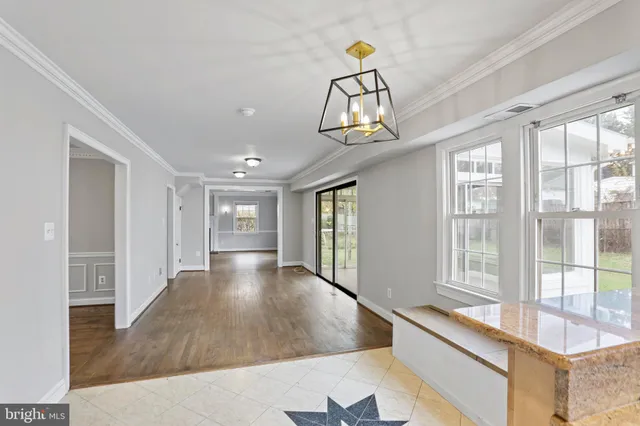 a view of a livingroom with furniture chandelier