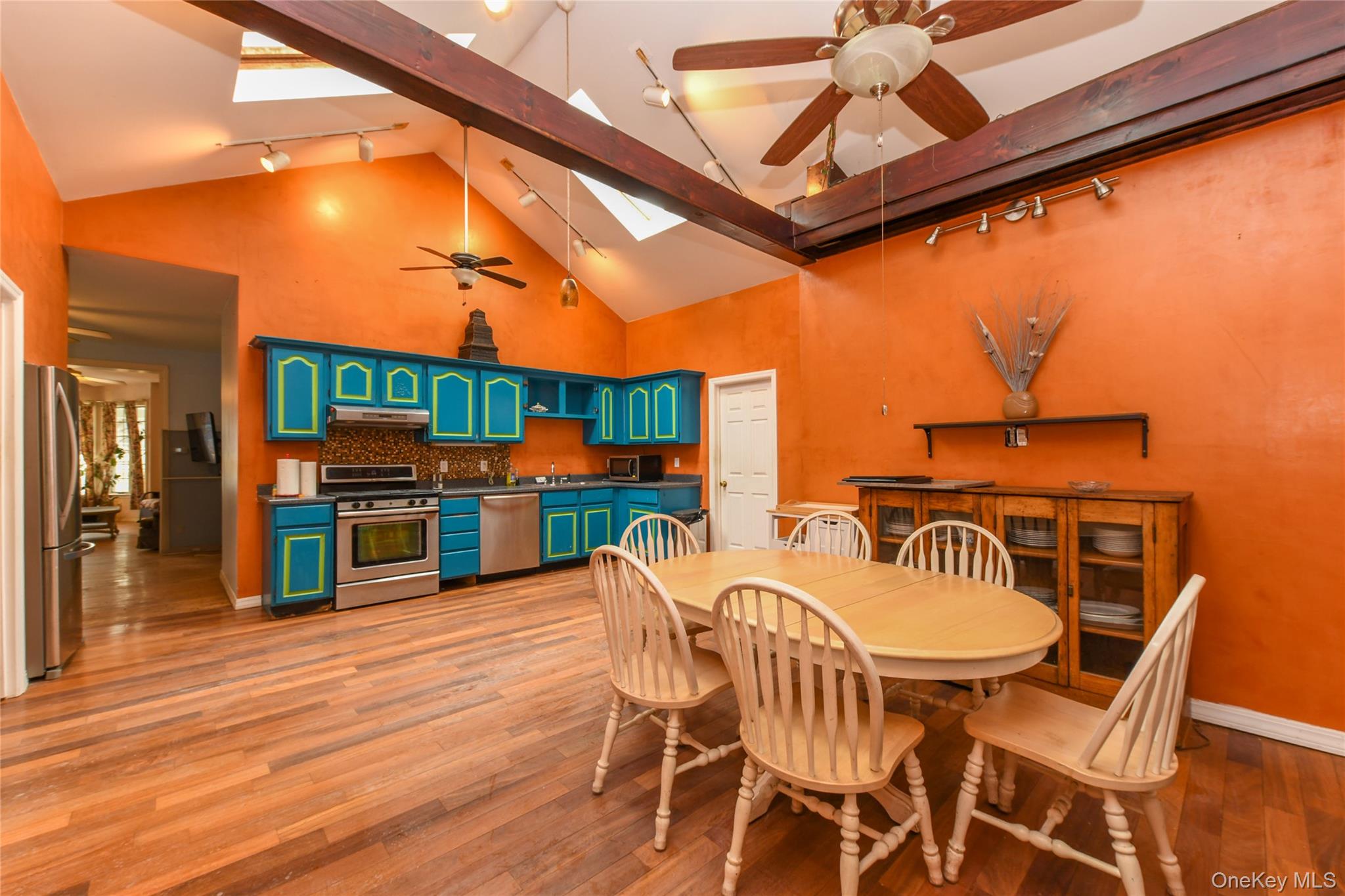 76-43 85th Road Queens, NY 11421 - Photo 17 of 31 a view of a chairs and table in the patio