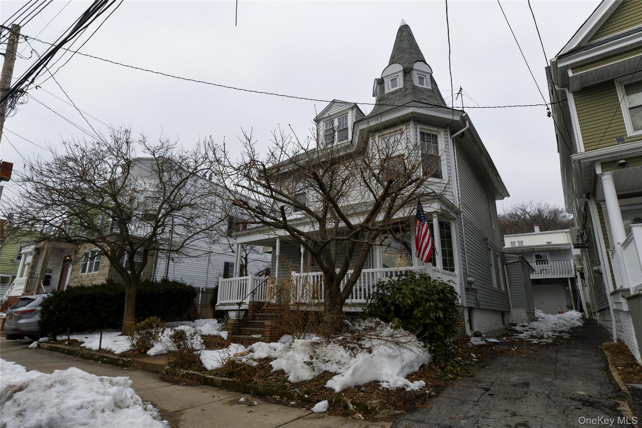 76-43 85th Road Queens, NY 11421 - Photo 2 of 31 a view of a house with a yard