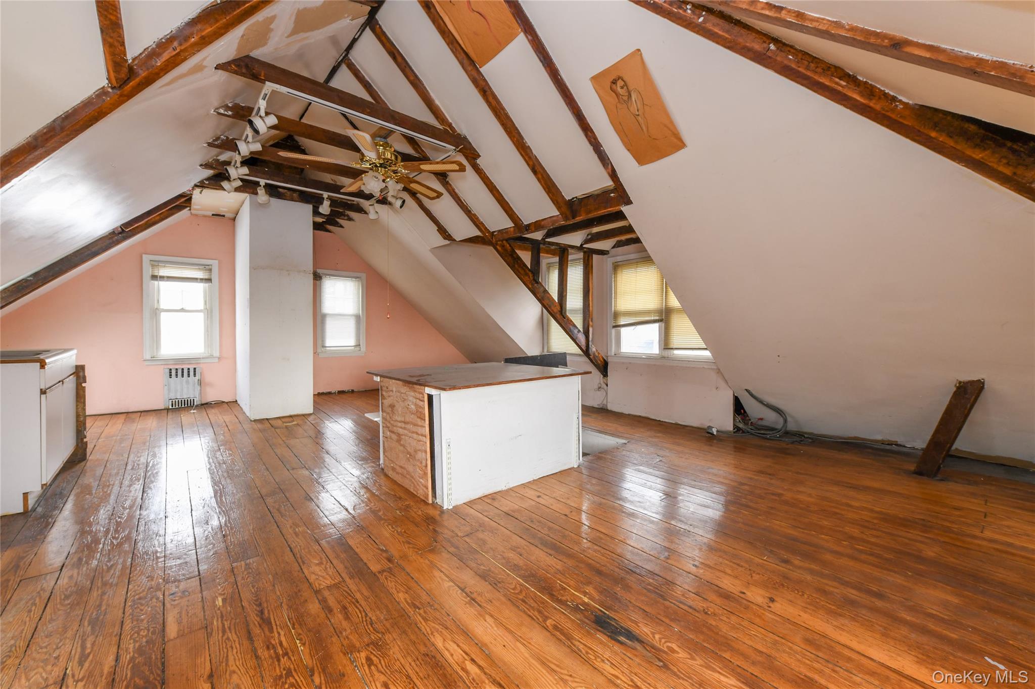 76-43 85th Road Queens, NY 11421 - Photo 28 of 31 a view of entryway and hall with wooden floor