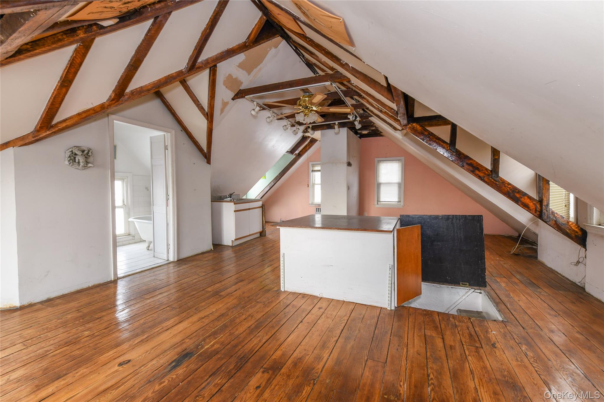 76-43 85th Road Queens, NY 11421 - Photo 29 of 31 a view of entryway and hall with wooden floor