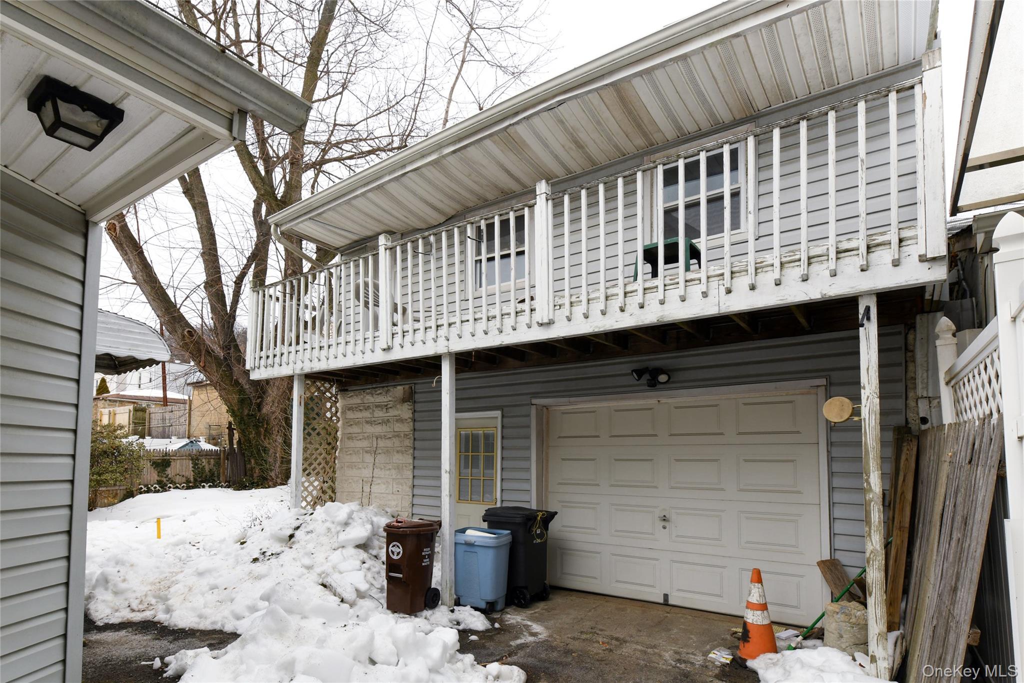 76-43 85th Road Queens, NY 11421 - Photo 3 of 31 a front view of a house with a yard