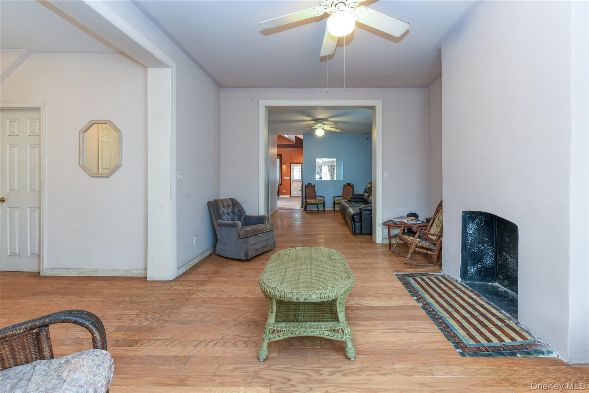 76-43 85th Road Queens, NY 11421 - Photo 10 of 31 a living room with furniture rug and window