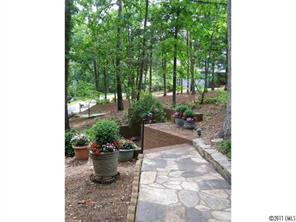 17 Catawba Ridge Road Lake Wylie, SC 29710 - Photo 16 of 16 a view of a backyard with sitting area