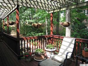 17 Catawba Ridge Road Lake Wylie, SC 29710 - Photo 5 of 16 a view of a balcony with chairs and plants