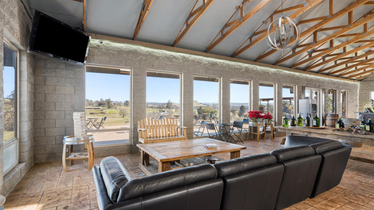 17000 Latrobe Road Plymouth, CA 95669 - Photo 14 of 41 a living room with furniture and a floor to ceiling window