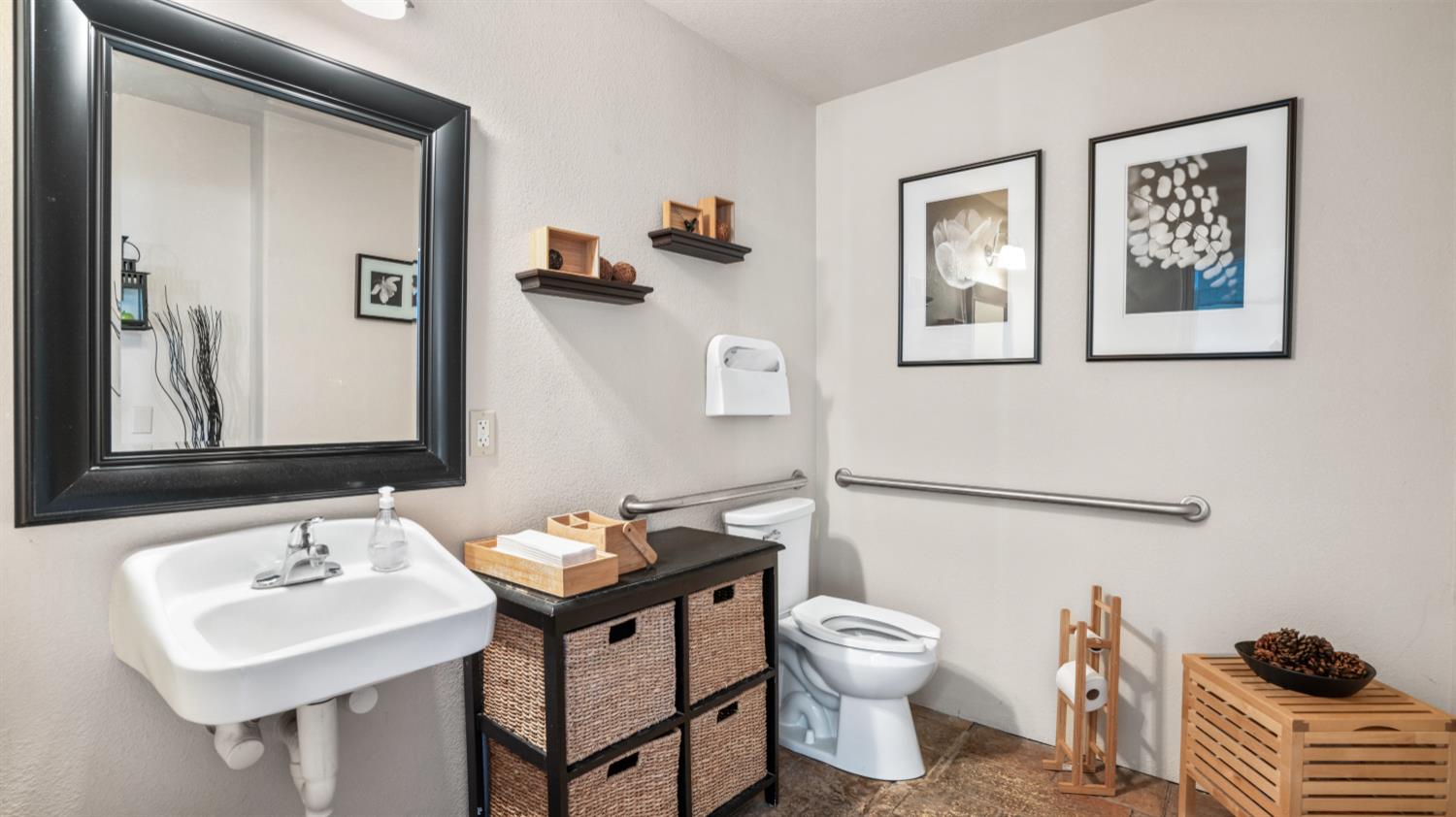 17000 Latrobe Road Plymouth, CA 95669 - Photo 23 of 41 a bathroom with a toilet a sink and mirror