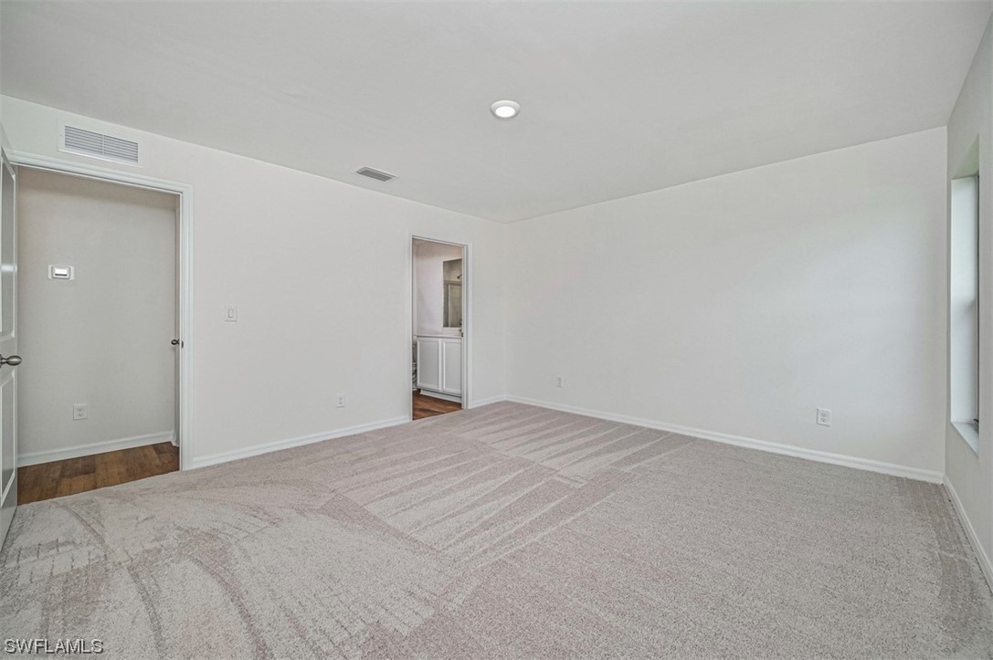 877 General Chesty Puller Court LaBelle, FL 33935 - Photo 14 of 22 a view of an empty room