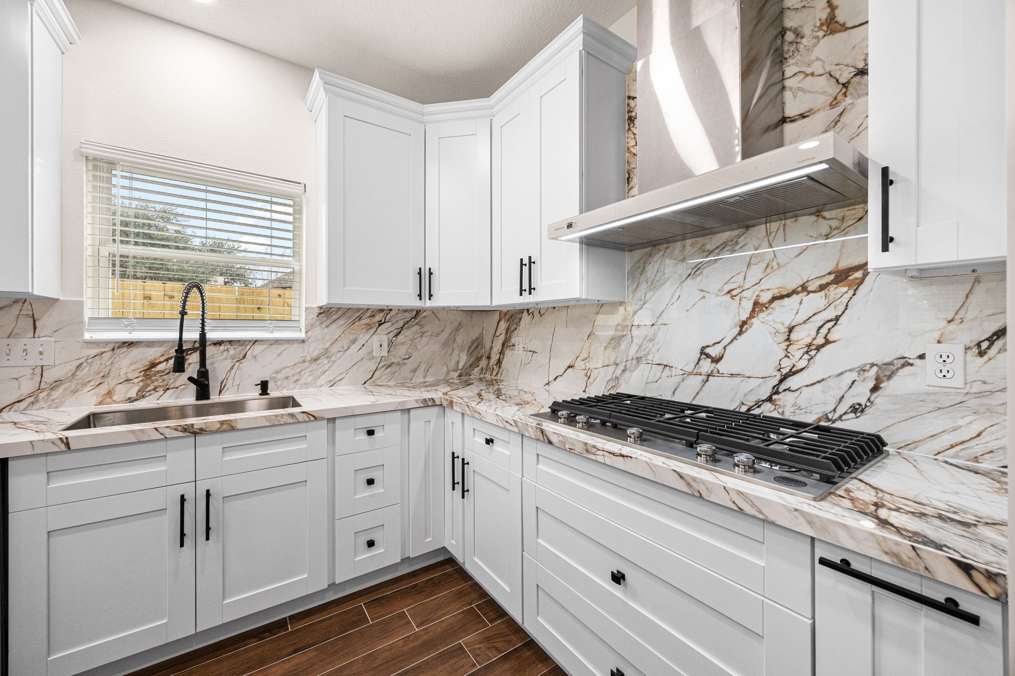 17907 Pelican Way Road Houston, TX 77084 - Photo 17 of 39 a kitchen with granite countertop white cabinets and white appliances