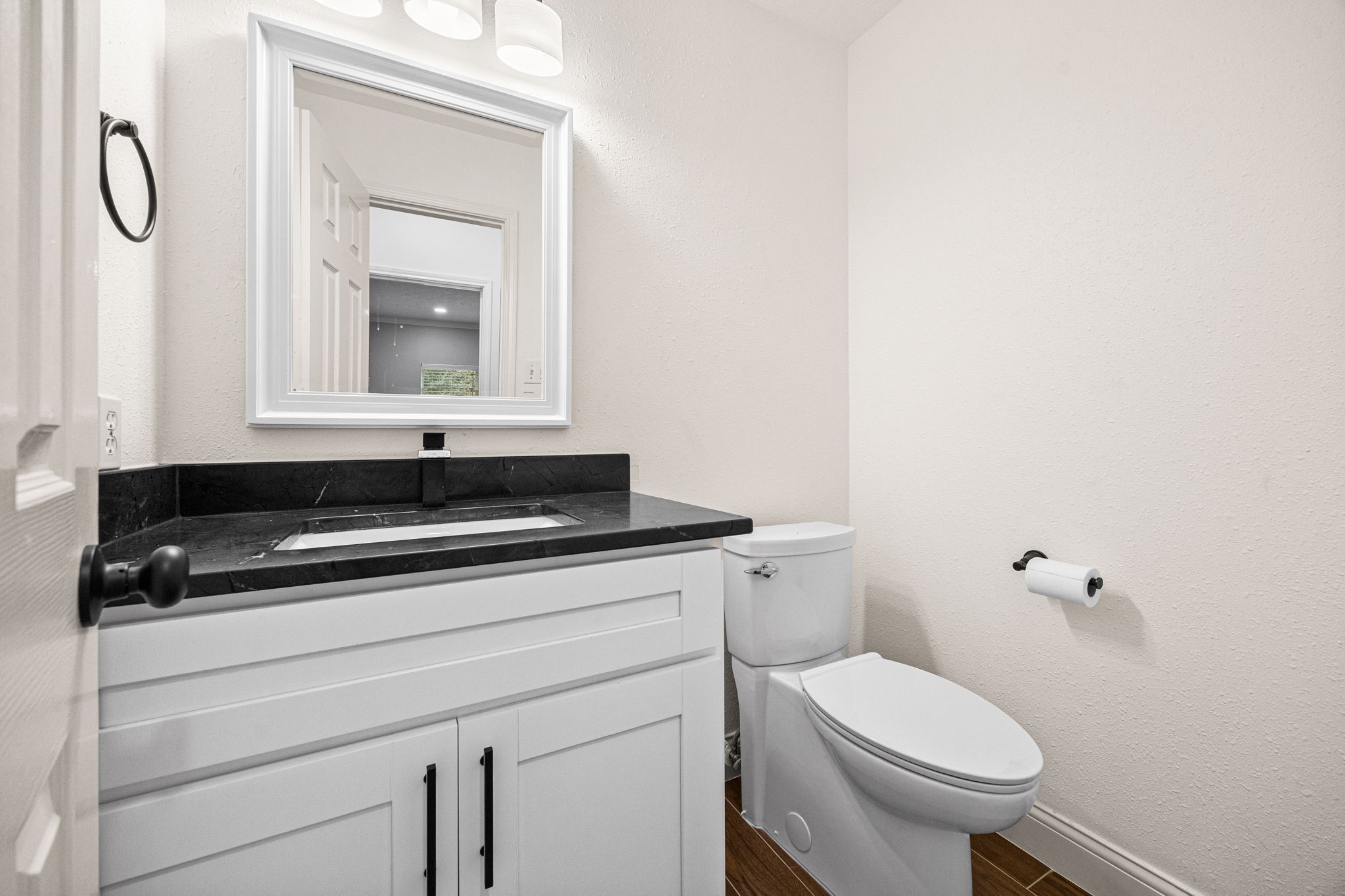 17907 Pelican Way Road Houston, TX 77084 - Photo 23 of 39 a bathroom with a sink a toilet and a mirror
