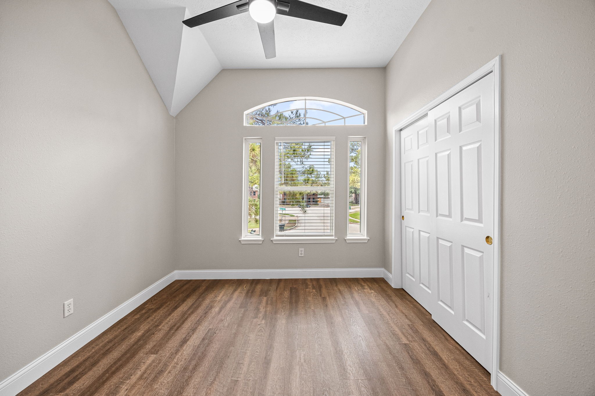 17907 Pelican Way Road Houston, TX 77084 - Photo 31 of 39 wooden floor in an empty room with a window