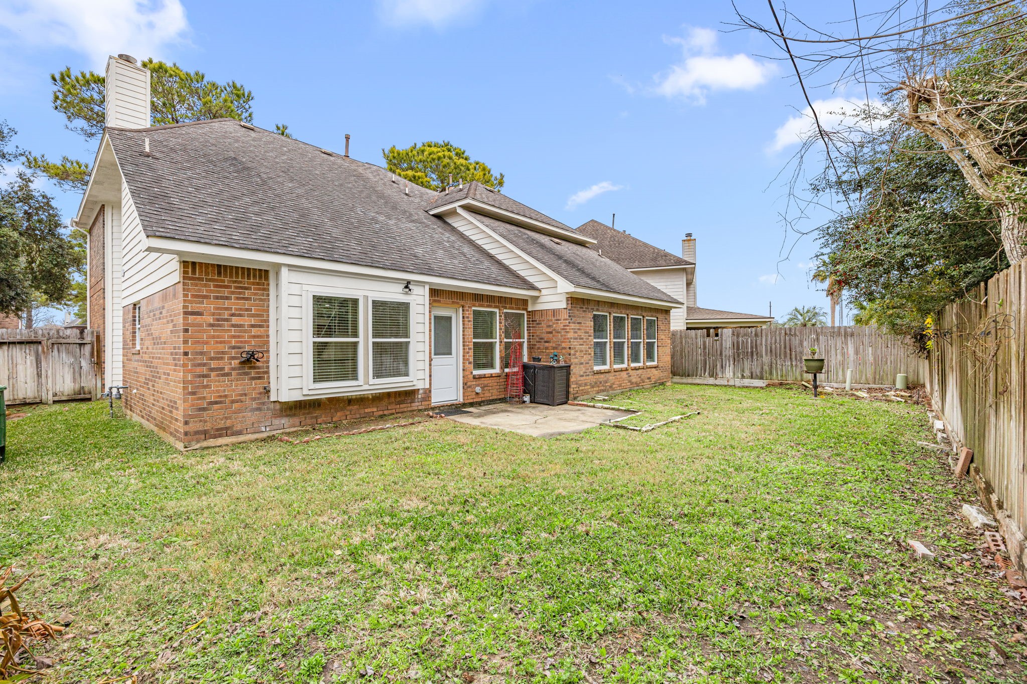 17907 Pelican Way Road Houston, TX 77084 - Photo 37 of 39 a view of a house with a backyard
