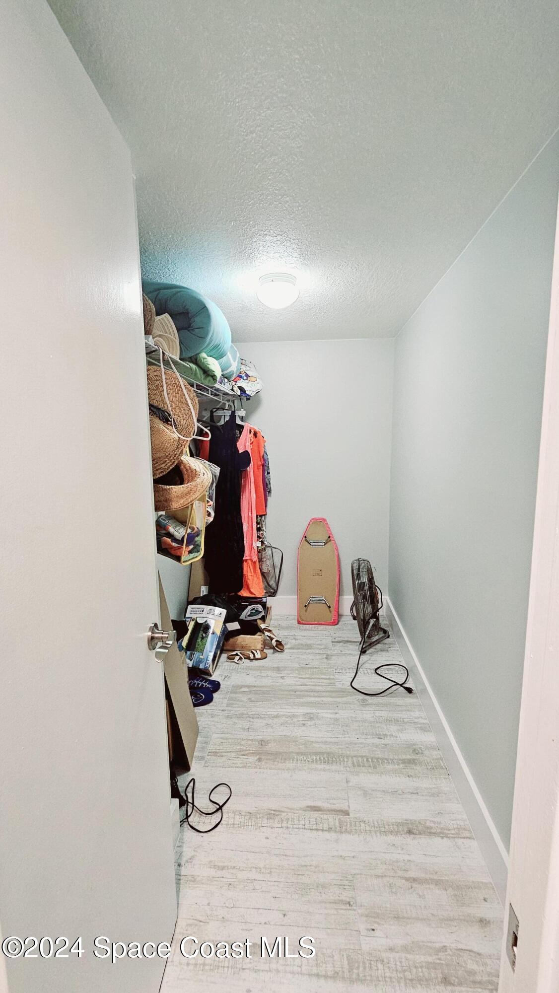 650 North Atlantic Avenue, Unit 109 Cocoa Beach, FL 32931 - Photo 18 of 36 a view of a room with gym equipment