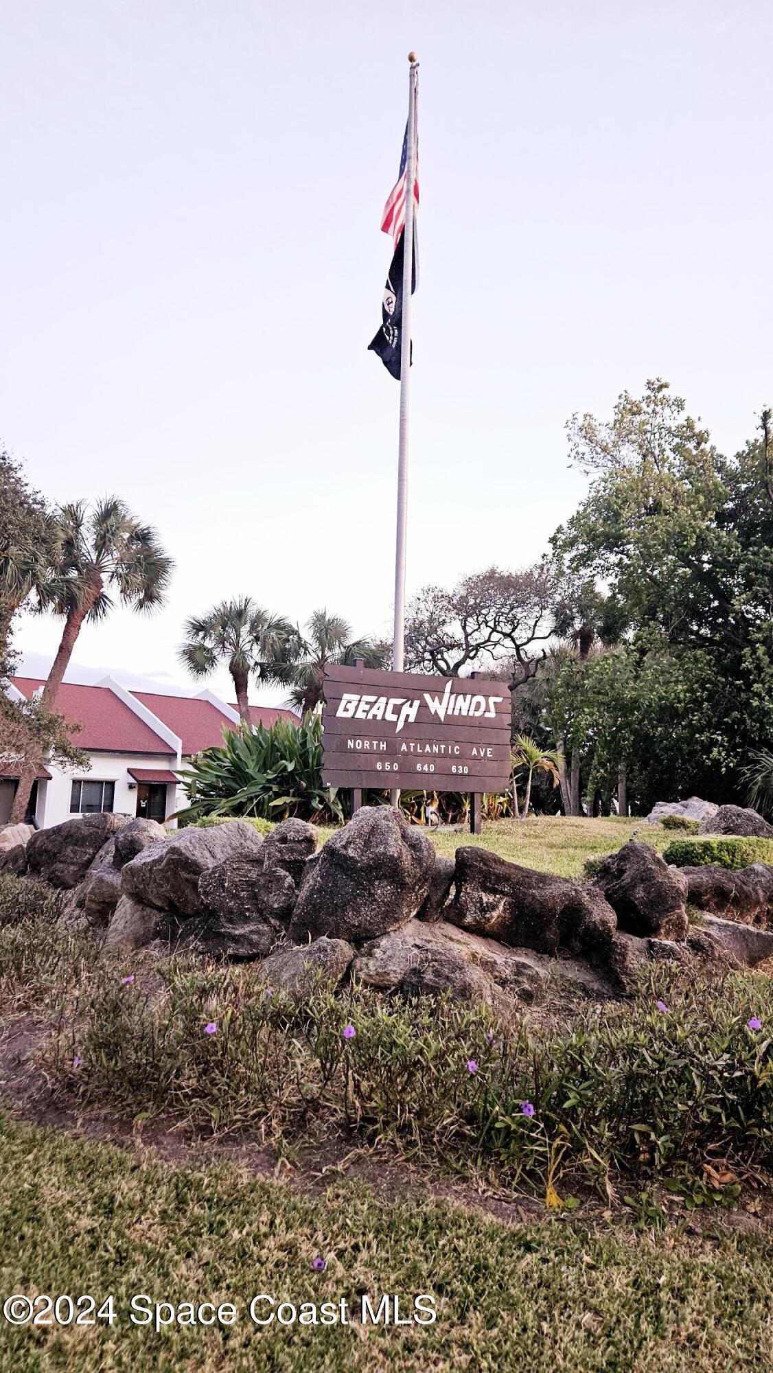 650 North Atlantic Avenue, Unit 109 Cocoa Beach, FL 32931 - Photo 31 of 36 a picture of houses with yard