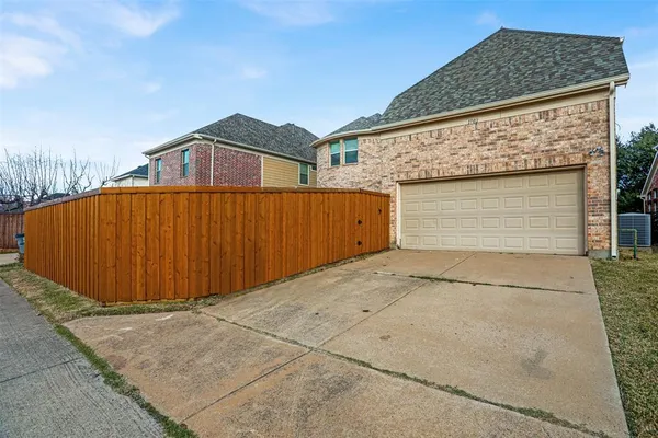 a front view of a house with a garage