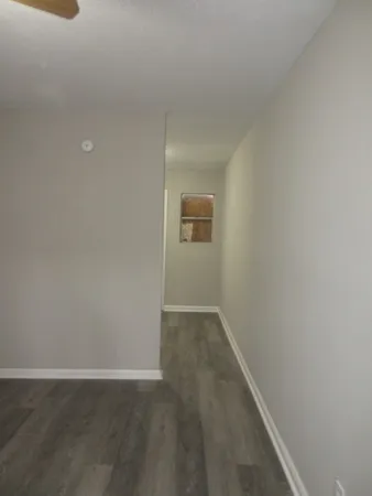 a bathroom with a sink and cabinets