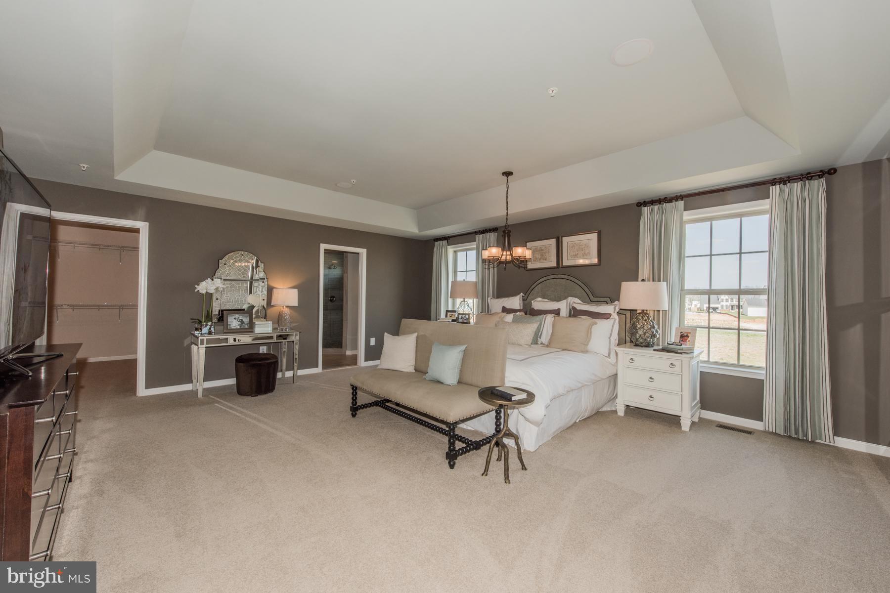 9772 Powder Hall Road Perry Hall, MD 21128 - Photo 21 of 28 a view of a livingroom with furniture and a flat screen tv