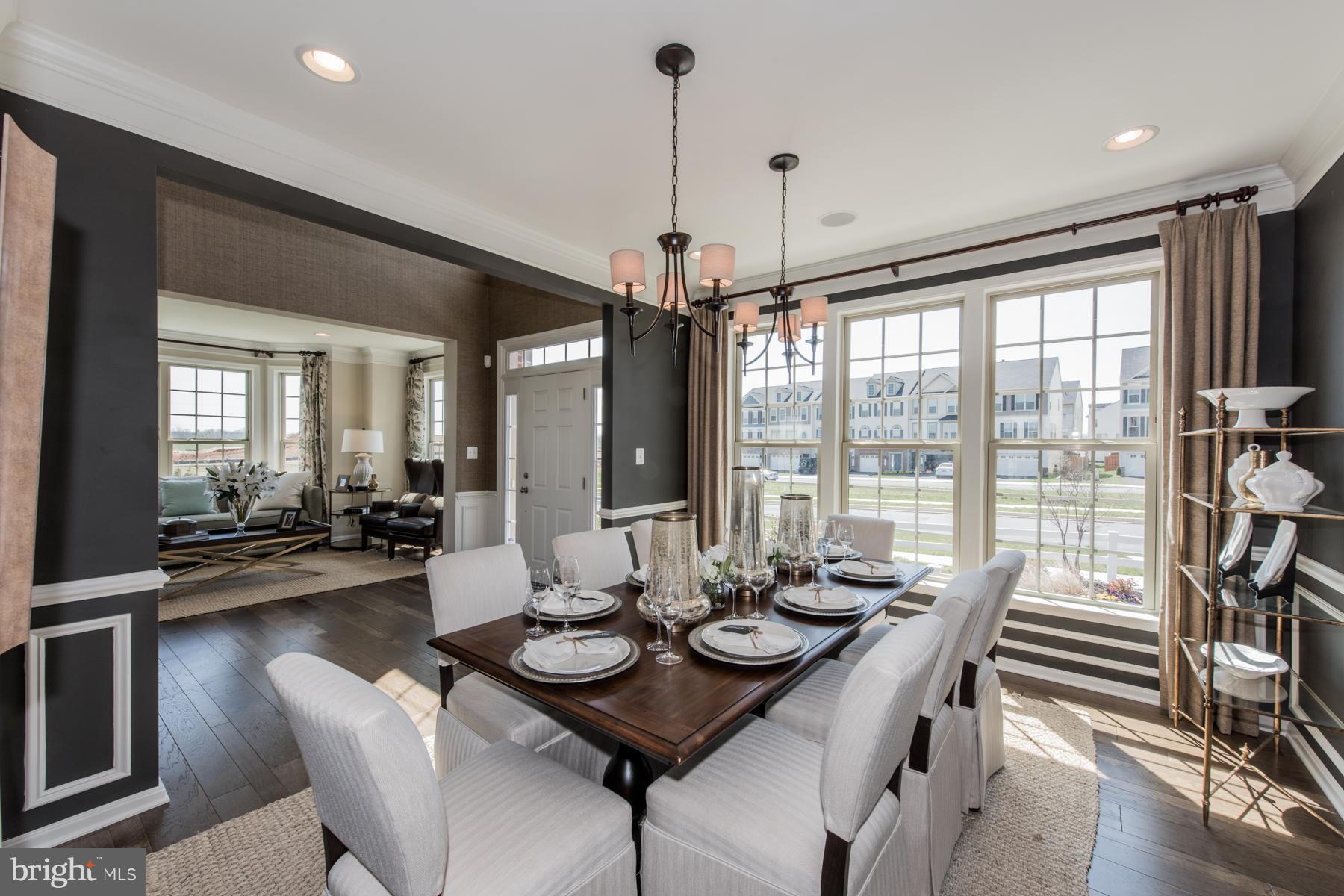 9772 Powder Hall Road Perry Hall, MD 21128 - Photo 5 of 28 a view of a dining room with furniture window and wooden floor