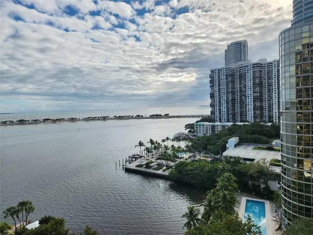 a view of a lake with a house