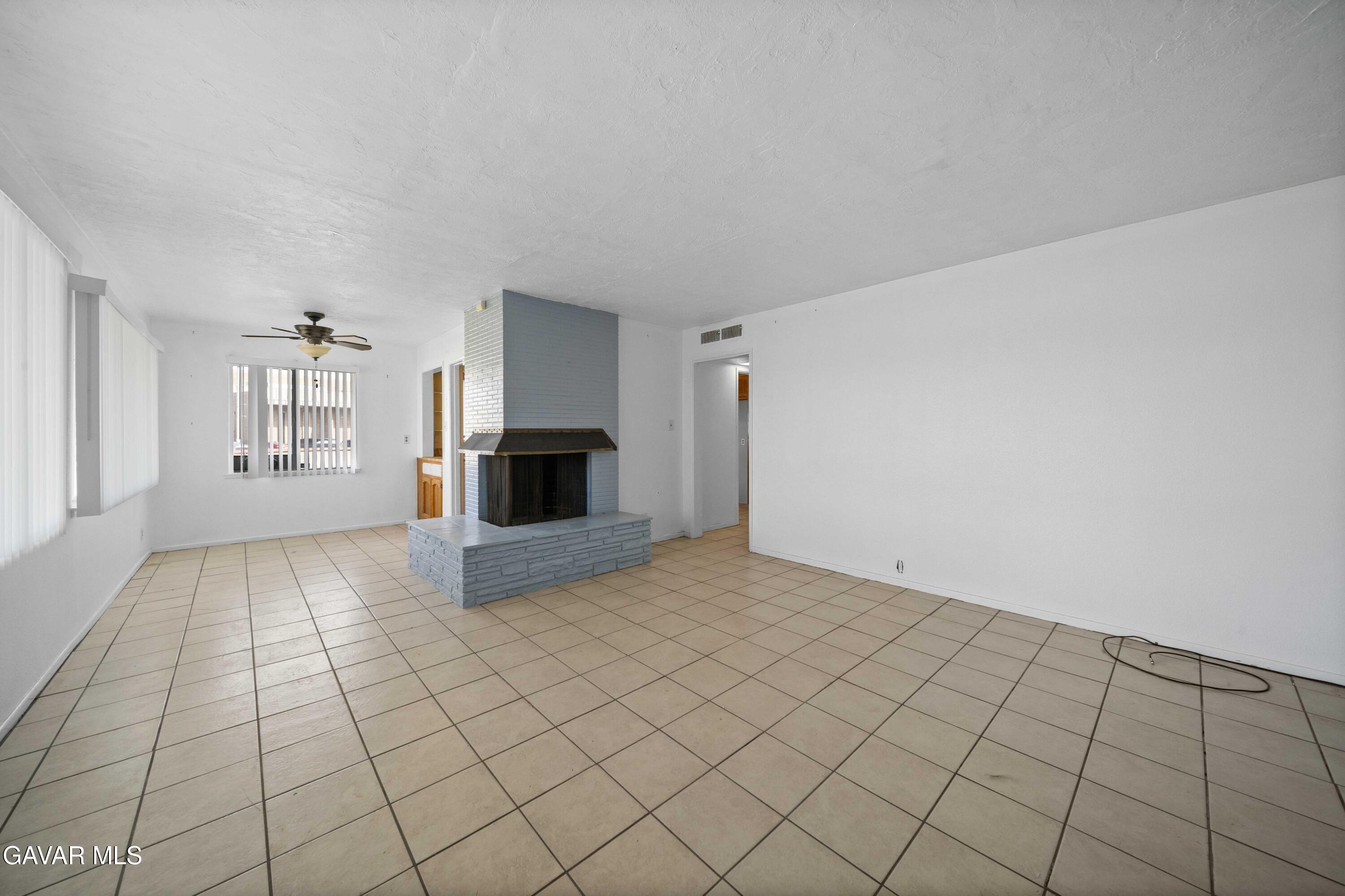 2000 Shasta Street Mojave, CA 93501 - Photo 7 of 21 a view of a livingroom with a fireplace