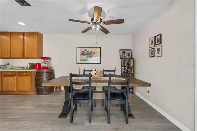 a view of a dining room with furniture