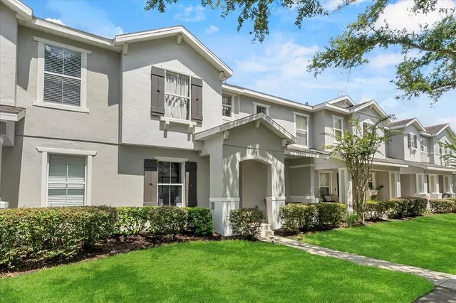 front view of a house with a yard