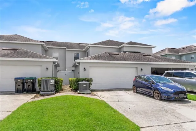 a car parked in front of a house