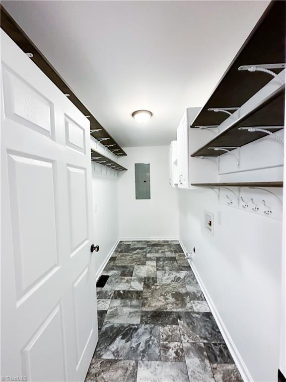 2368 W.O.W. Road Randleman, NC 27317 - Photo 16 of 31 Laundry Room with Cabinets and custom solid wood shelving. Room for a chest freezer and washing machine and dryer. Was used also as a pantry.