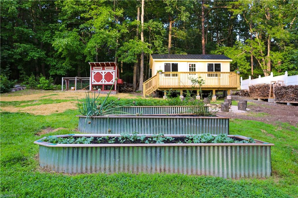2368 W.O.W. Road Randleman, NC 27317 - Photo 8 of 31 She Shed, Chicken Coop, Fire Pit, Raised Garden beds