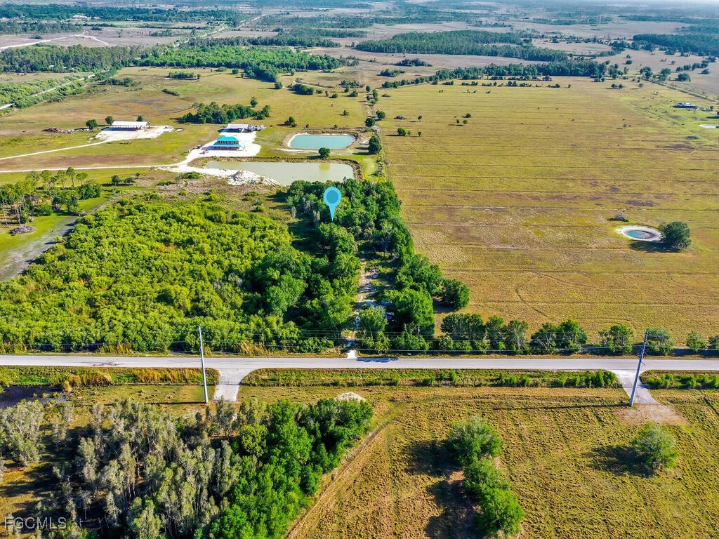 38210 Cook Brown Road Punta Gorda, FL 33982 - Photo 12 of 20 a view of an ocean and trees