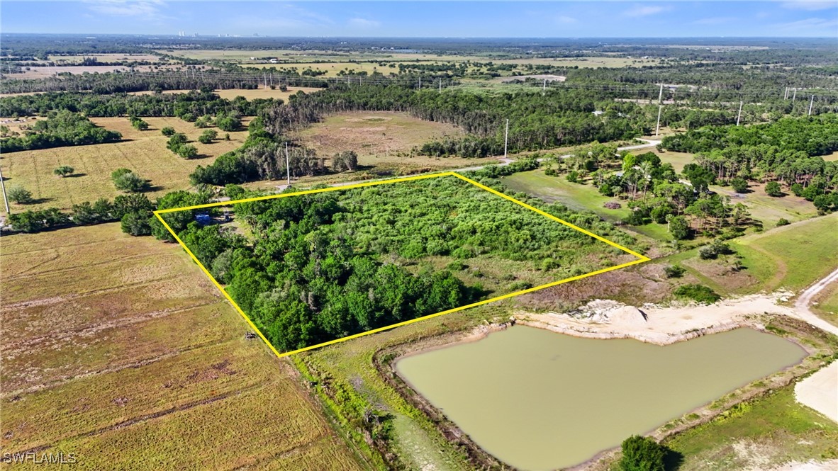 38210 Cook Brown Road Punta Gorda, FL 33982 - Photo 3 of 20 an aerial view of a house with a yard