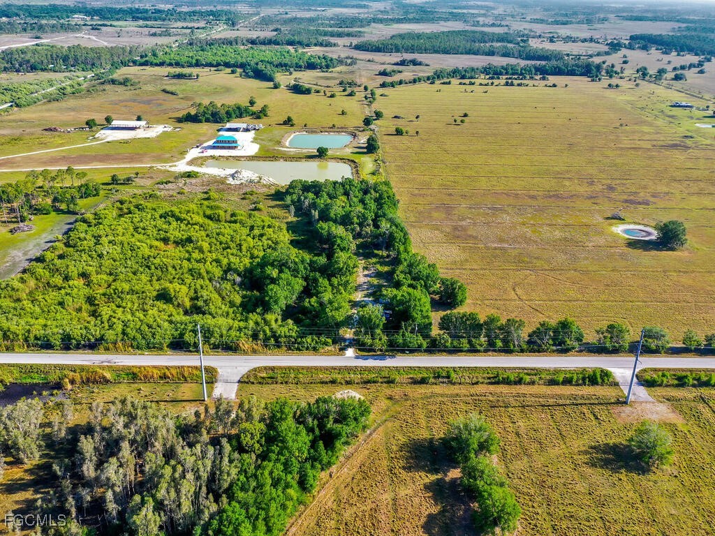 38210 Cook Brown Road Punta Gorda, FL 33982 - Photo 4 of 20 a view of an ocean and trees