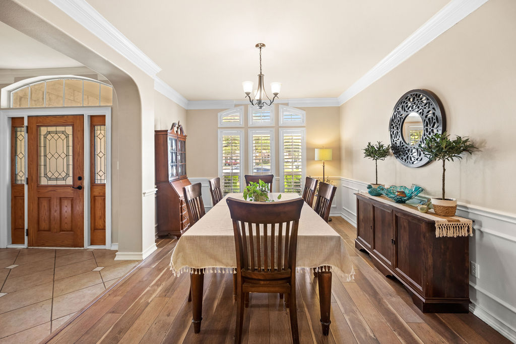 4600 Slickrock Cove Austin, TX 78747 - Photo 12 of 40 a view of a dining room with furniture window and wooden floor