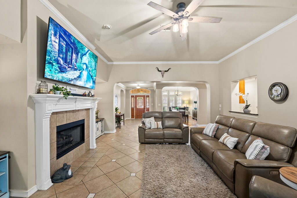 4600 Slickrock Cove Austin, TX 78747 - Photo 16 of 40 a living room with furniture and a fireplace