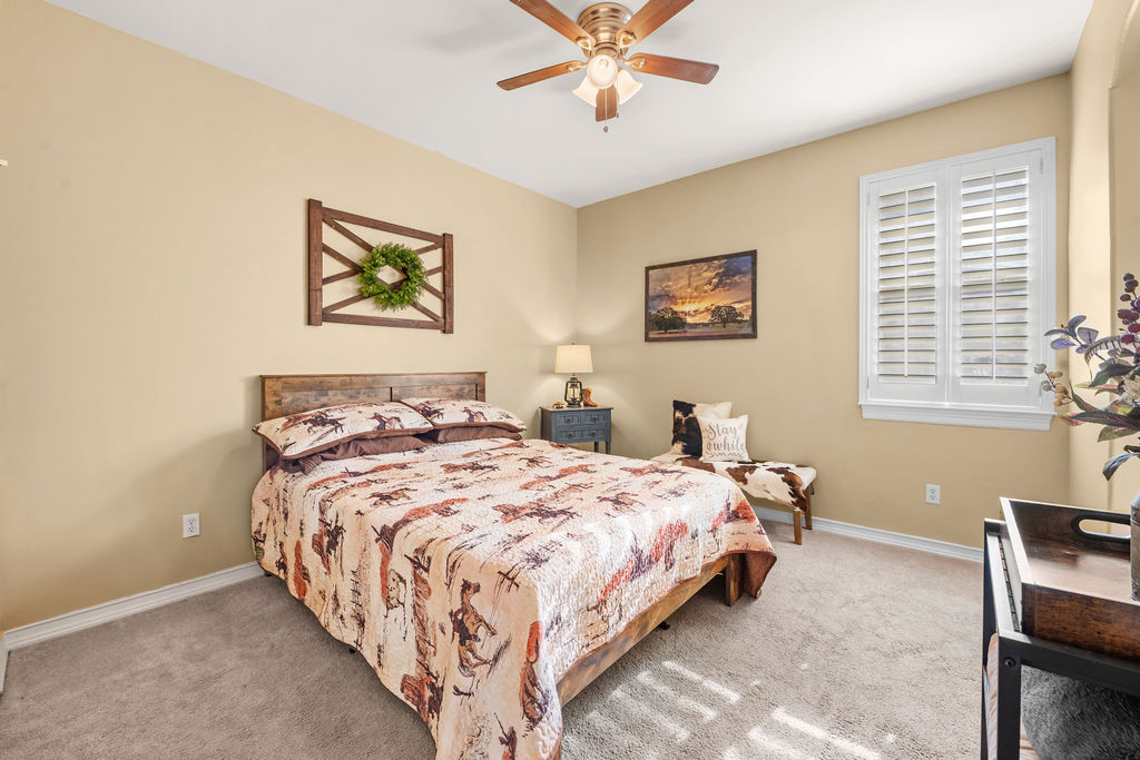 4600 Slickrock Cove Austin, TX 78747 - Photo 26 of 40 a bedroom with bed and a window