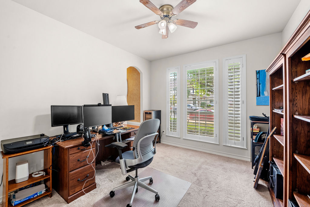 4600 Slickrock Cove Austin, TX 78747 - Photo 29 of 40 a view of a workspace with furniture and a window