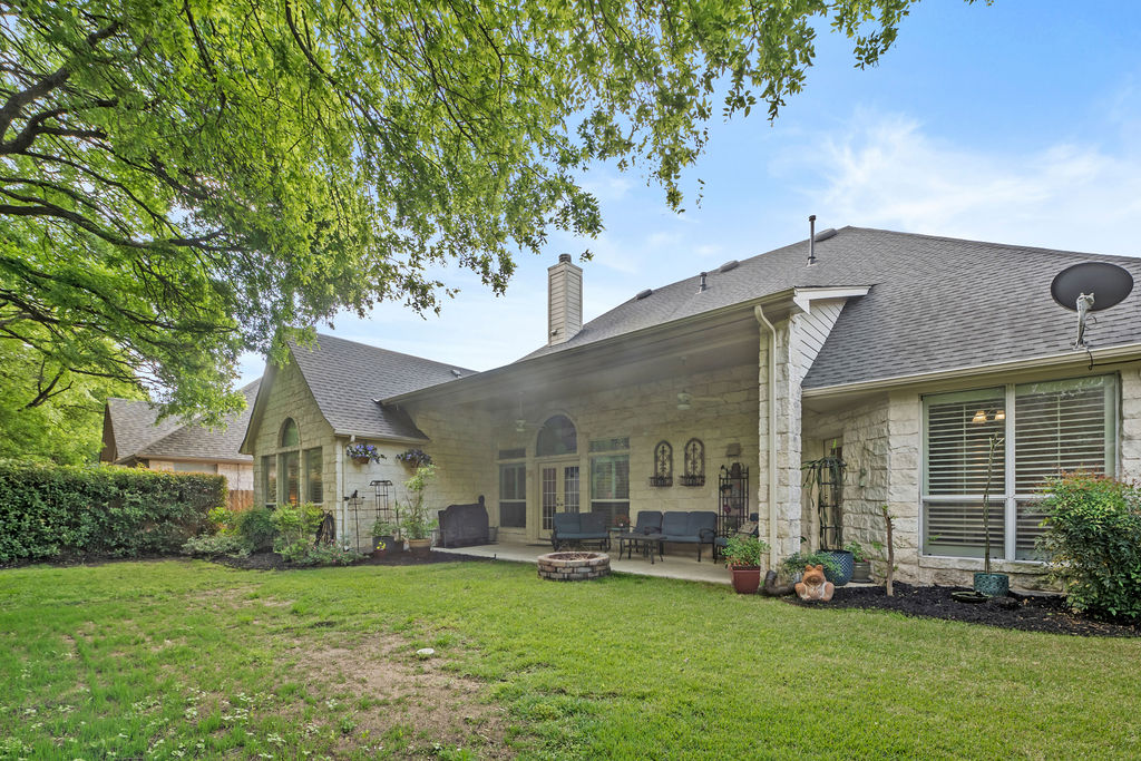 4600 Slickrock Cove Austin, TX 78747 - Photo 35 of 40 a view of a house with a yard porch and sitting area