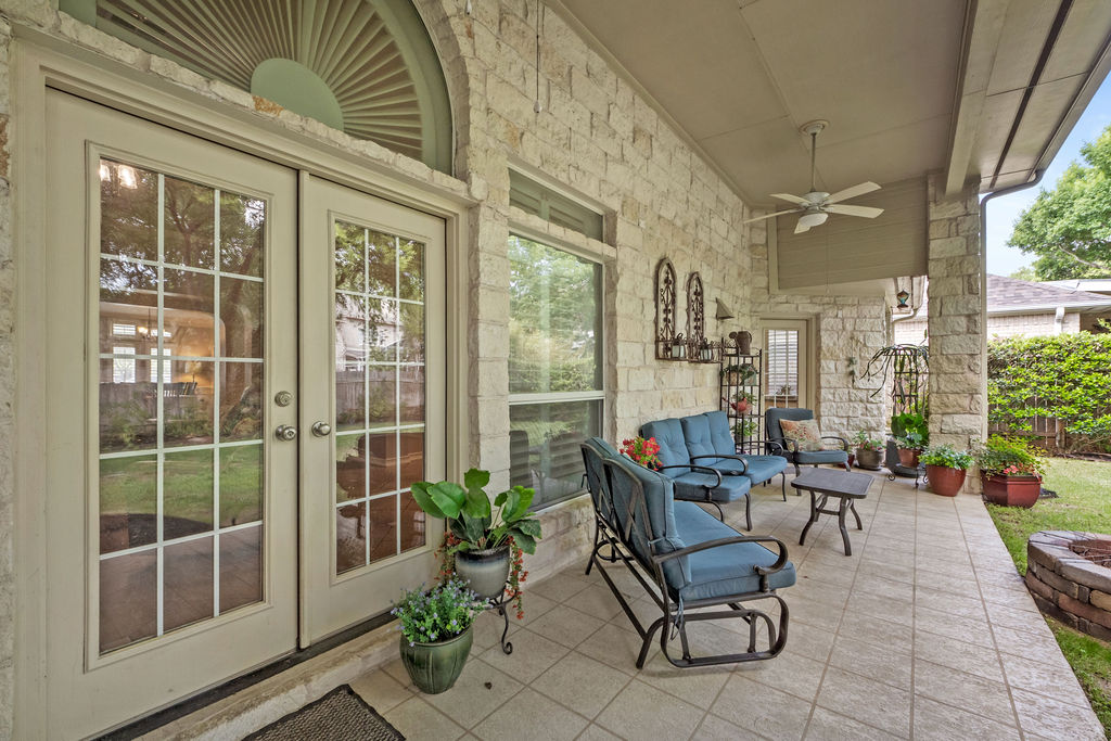 4600 Slickrock Cove Austin, TX 78747 - Photo 39 of 40 a building outdoor space with patio furniture and potted plants