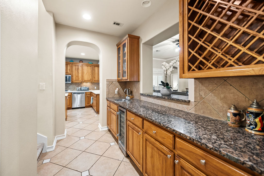 4600 Slickrock Cove Austin, TX 78747 - Photo 10 of 40 a view of a kitchen with a sink and cabinets