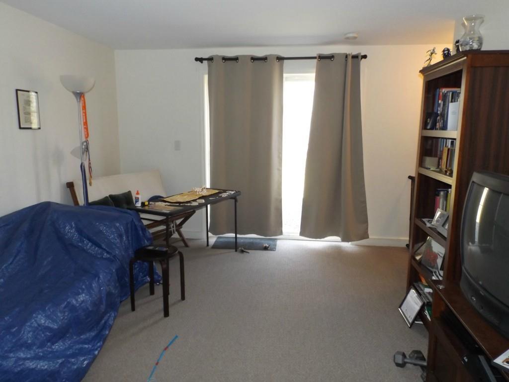 569 Back Winterport Road Winterport, ME 04496 - Photo 14 of 19 Unit 2, basement family room. ...