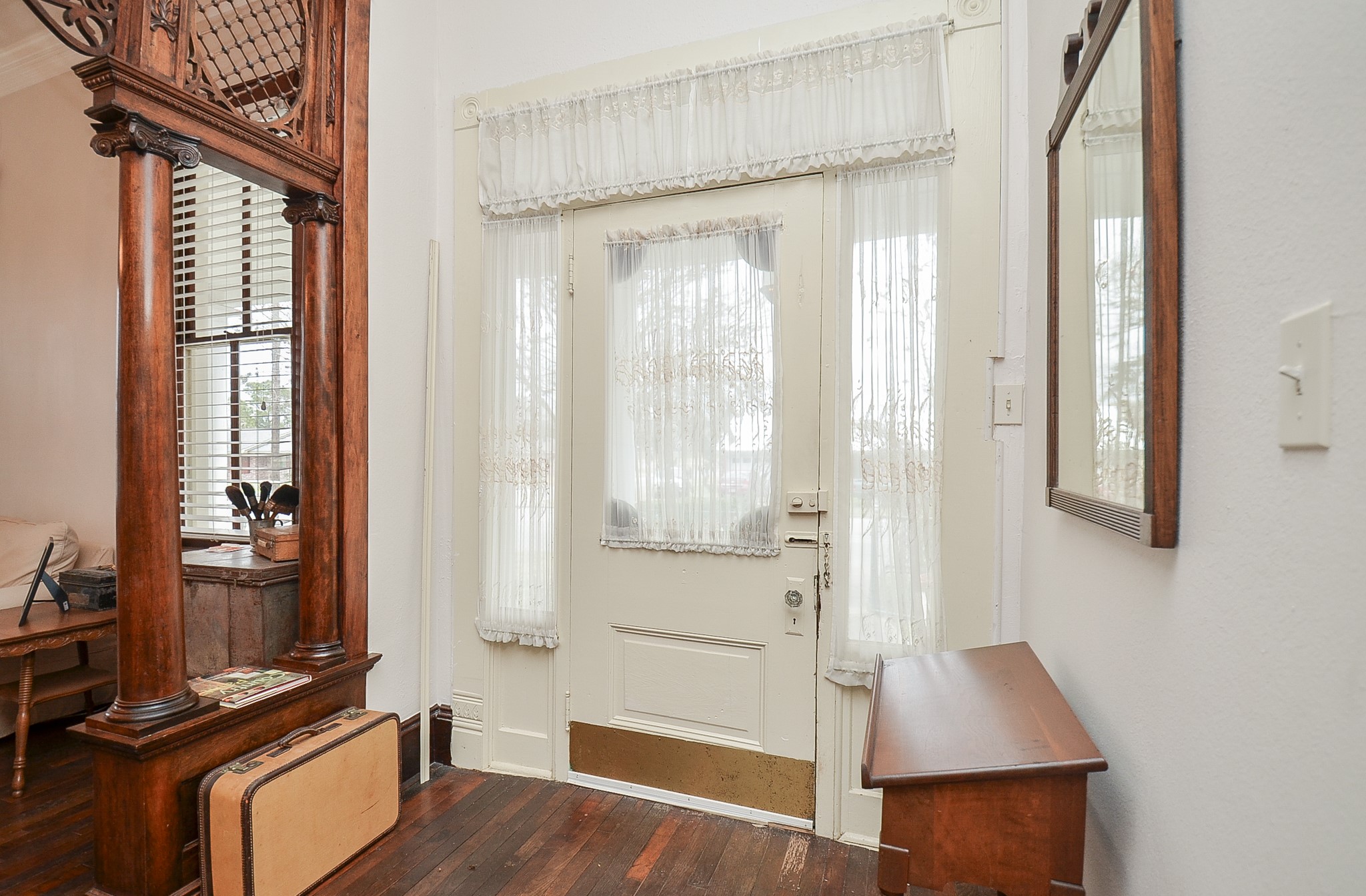 1205 12th Street Hempstead, TX 77445 - Photo 6 of 36 a room with wooden floor and windows