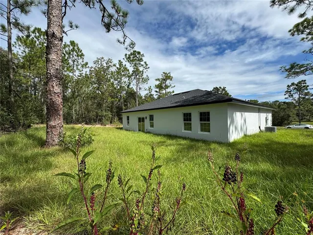 a view of outdoor space and yard