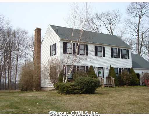 49 Twin Oak Farm Road Wallingford, CT 06492 - Photo 1 of 1 a front view of a house with a yard