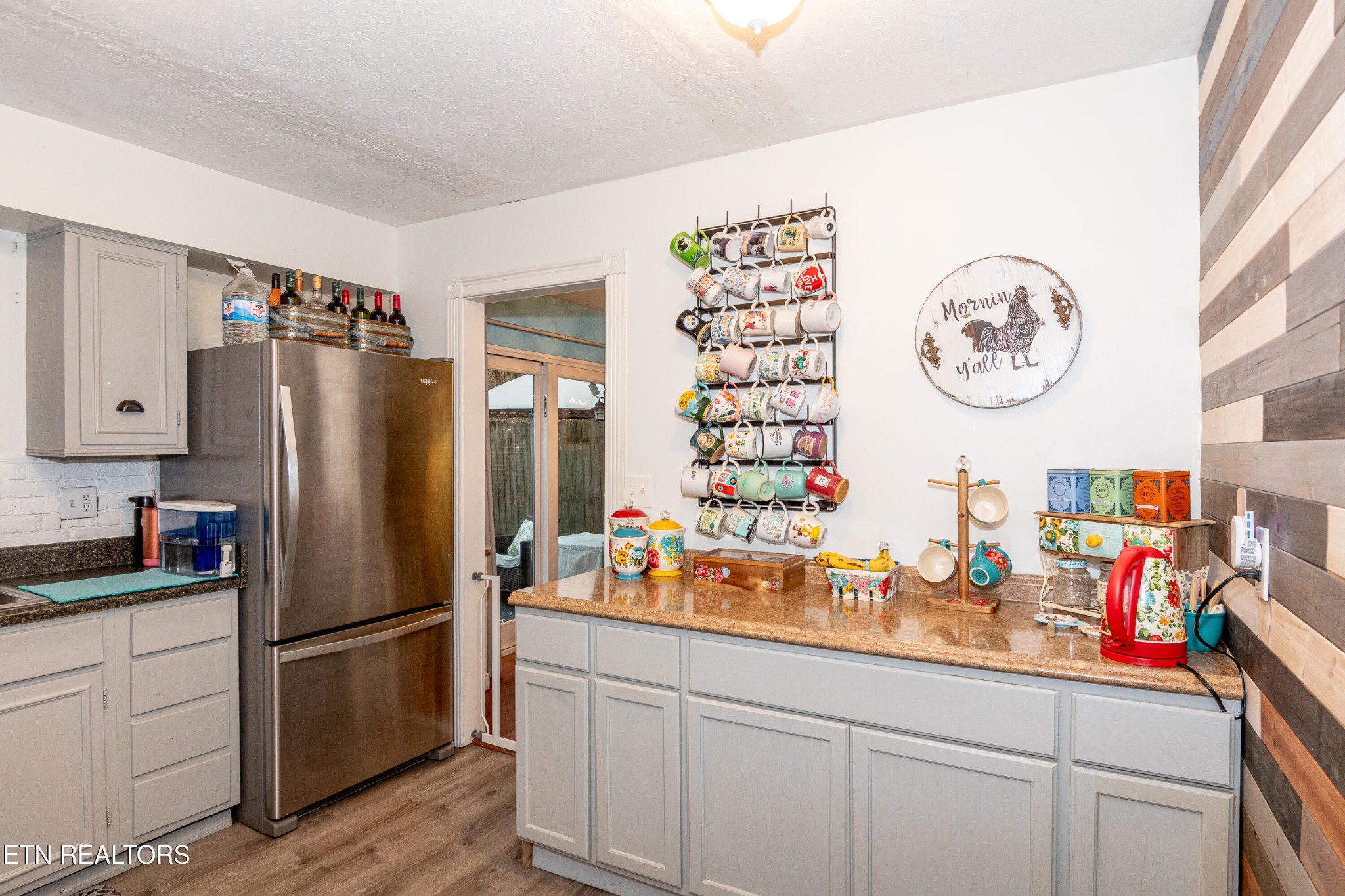 109 Ivy Lane Clinton, TN 37716 - Photo 12 of 36 a kitchen with stainless steel appliances a refrigerator and a sink