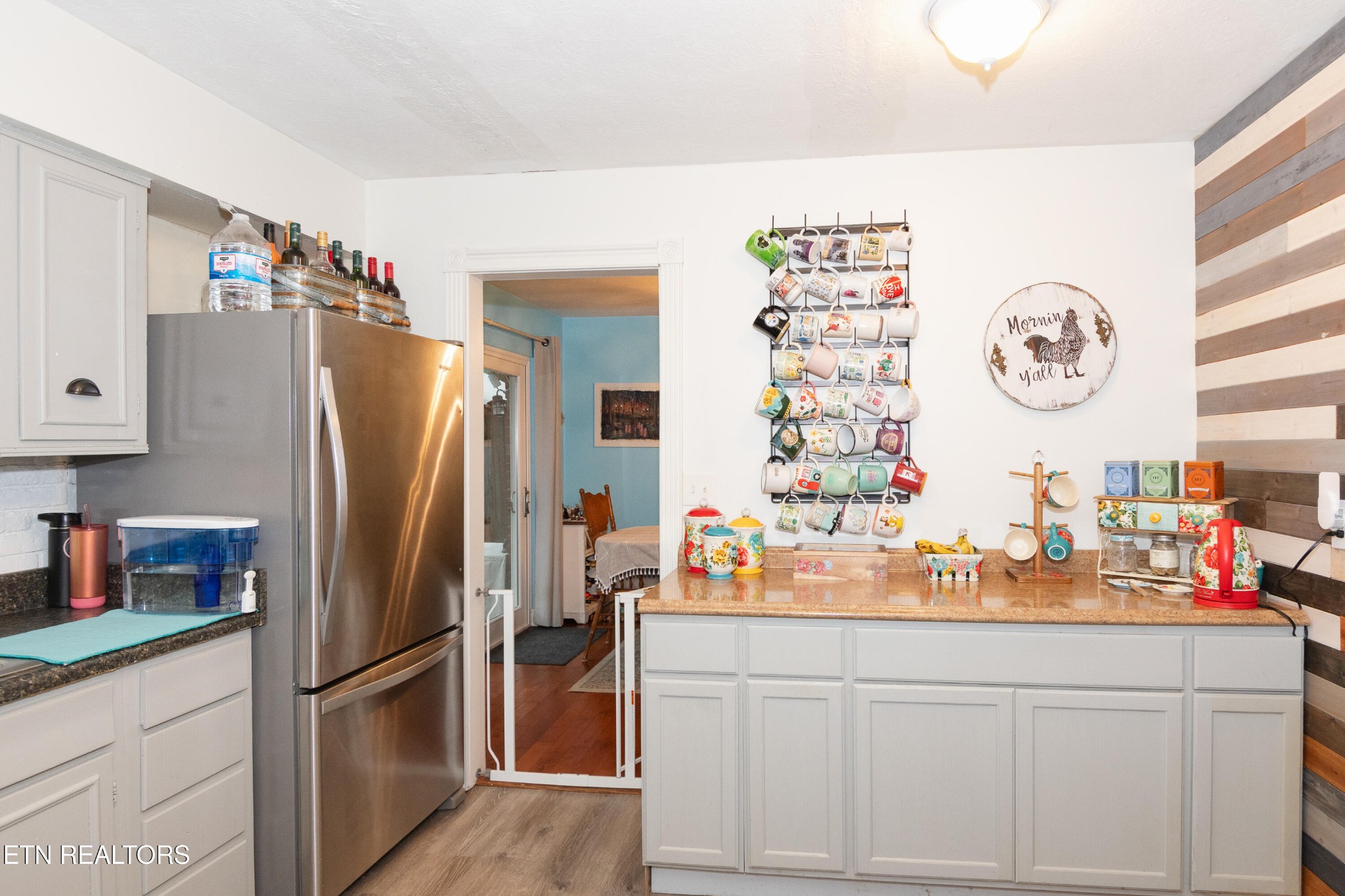 109 Ivy Lane Clinton, TN 37716 - Photo 13 of 36 a kitchen with stainless steel appliances a refrigerator and a sink