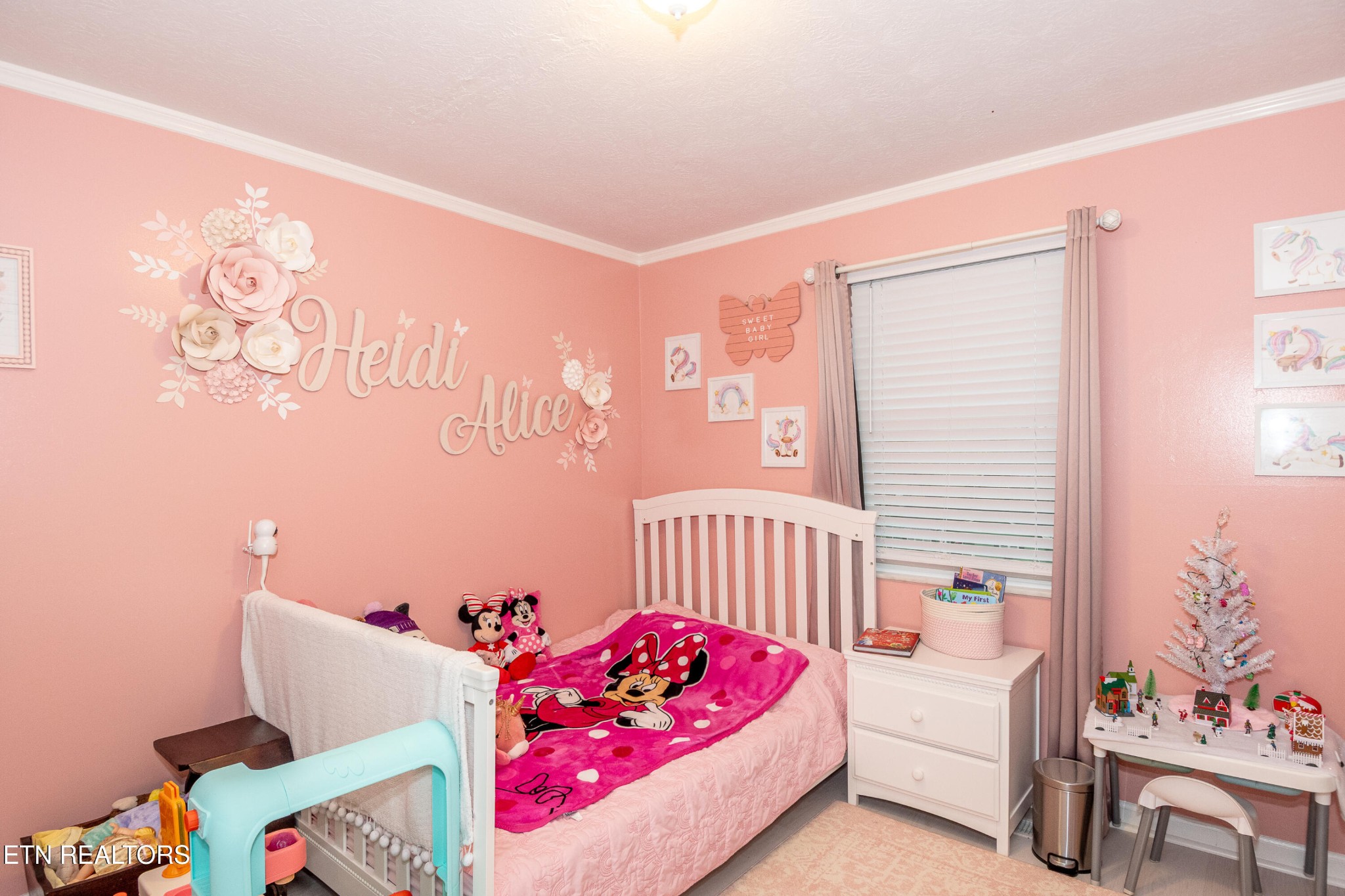109 Ivy Lane Clinton, TN 37716 - Photo 19 of 36 a bedroom with a bed and a couch